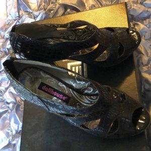Black 6.5 Dollhouse brand high heel shoes.